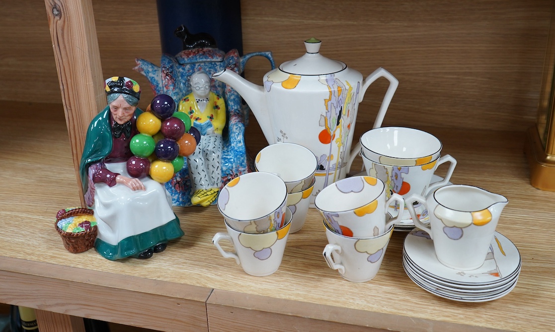 A Royal Doulton figure, 'Balloon seller', a Tams ware part coffee set and a Swineside teapot. Condition - fair